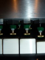 pianos keys played by mechanical finger